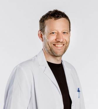 Dr. med.  Adrian Baumgartner